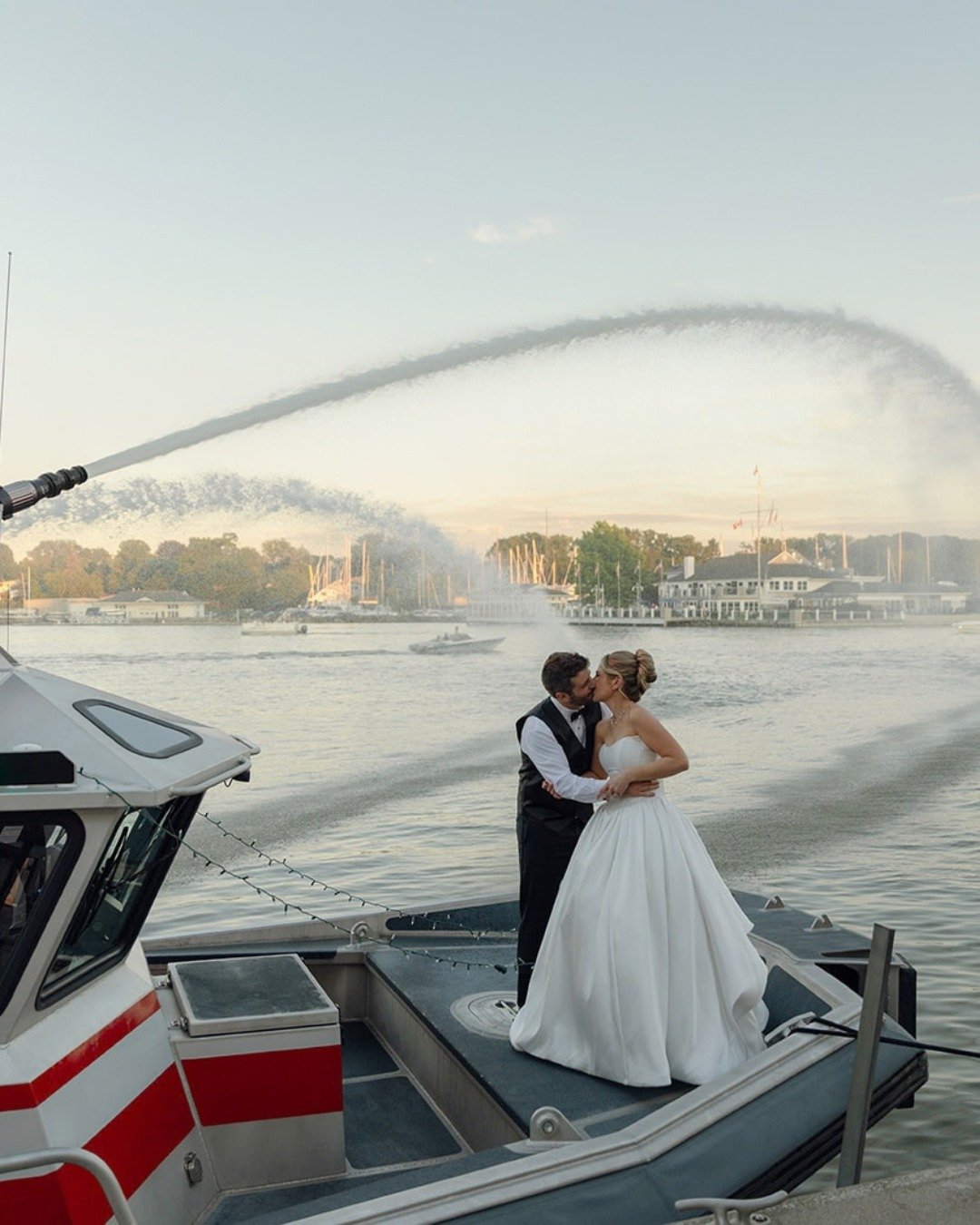 the evening light + the open water💦🤍

venue: @arborvenues @arborattheport
photographer: @garrettmaynrd
florist: @eriewayflowers
hair &amp; makeup: @taylormariestudio + @giadoesmymakeup
band: Candy Shop
catering: @farecatering.co
dessert: @tortaroc