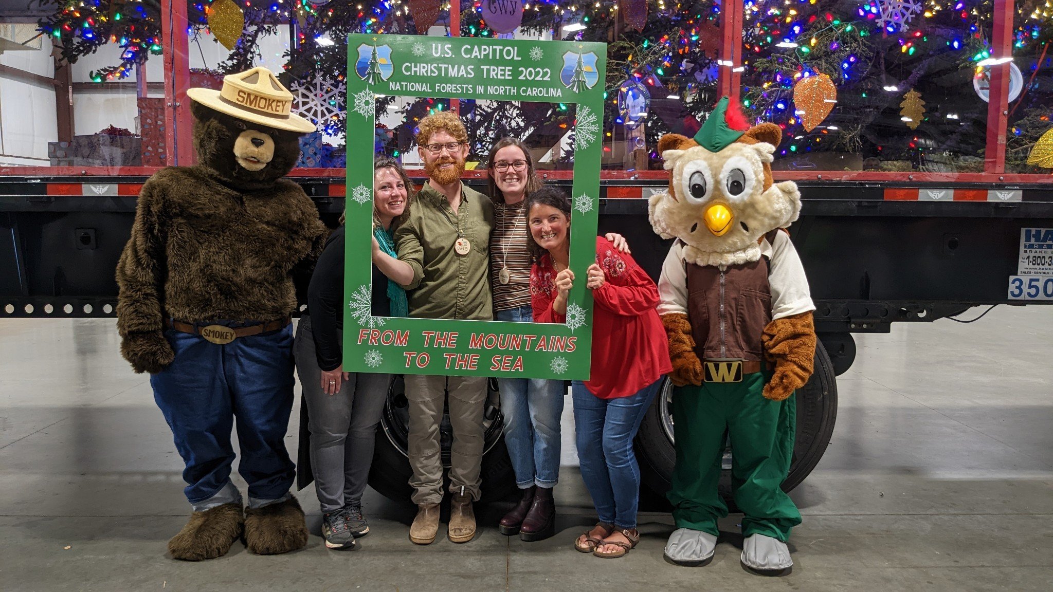 SAF members pose for a picture with Smokey Bear and Woodsy Owl. 