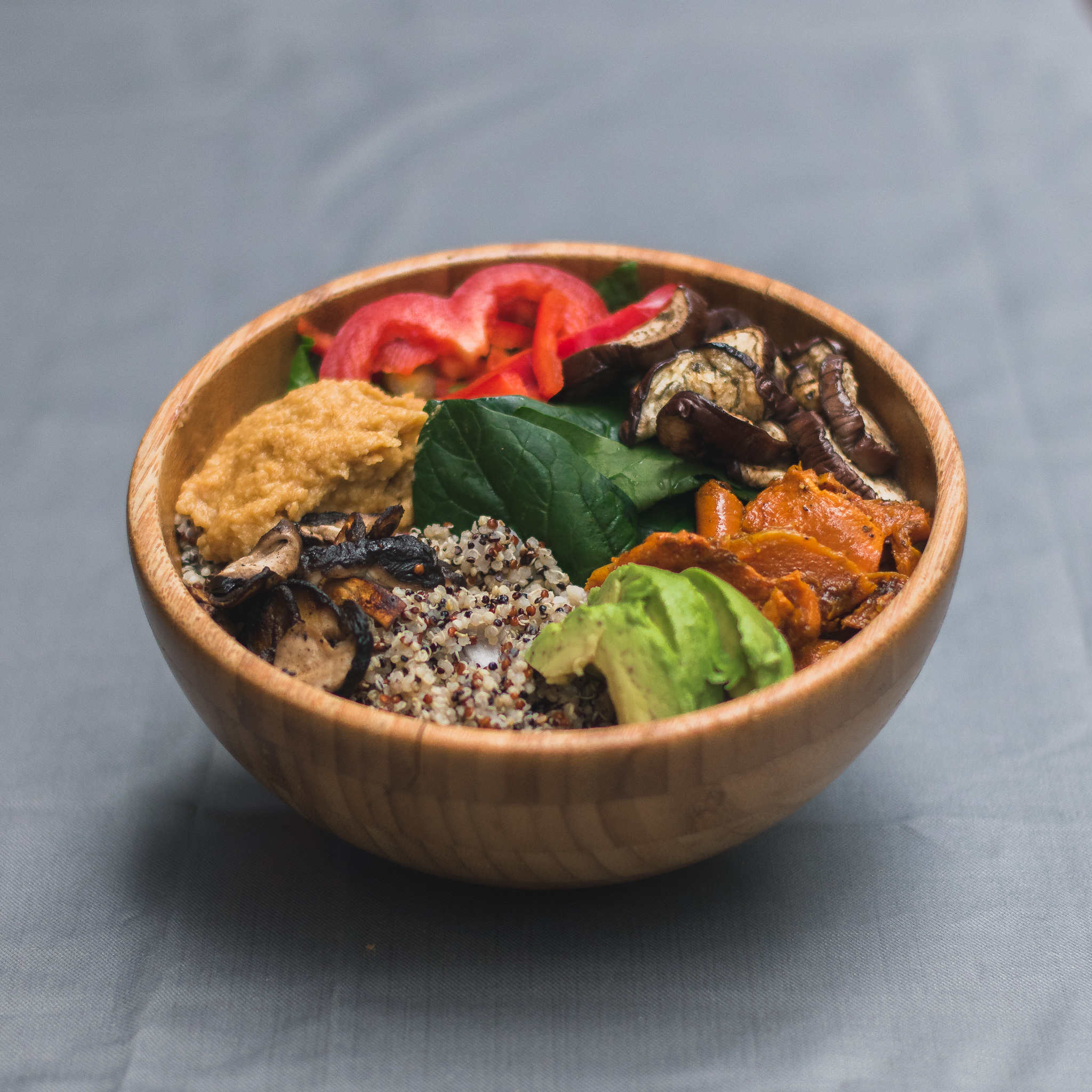 Veggie bomb, baby spinach, hummus, red pepper, eggplant, pumpkin, quinoa & avocado
