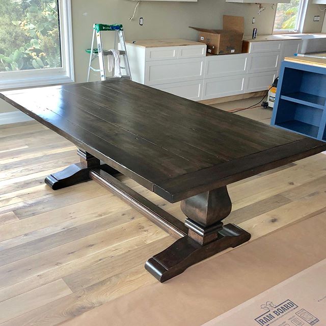 We stripped and bleached this large alder table. Once all the color was removed, we stained with this rich beautiful color and low sheen lacquer finish.