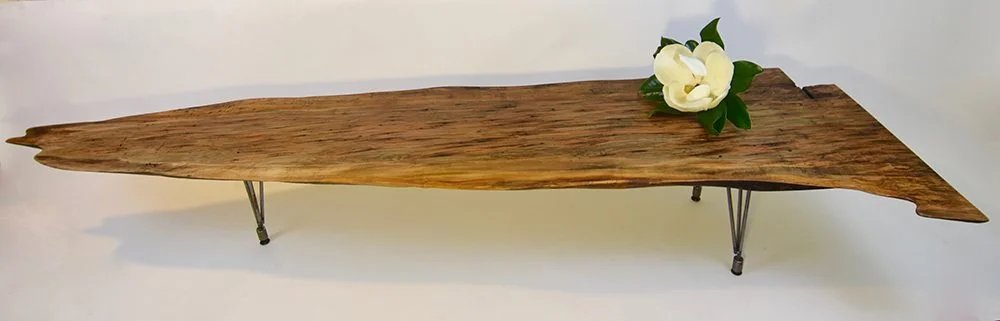Architect Robert M. Cain created this table from one of the ambrosia maple slabs. Photo credit: Chris Herrin Photography.