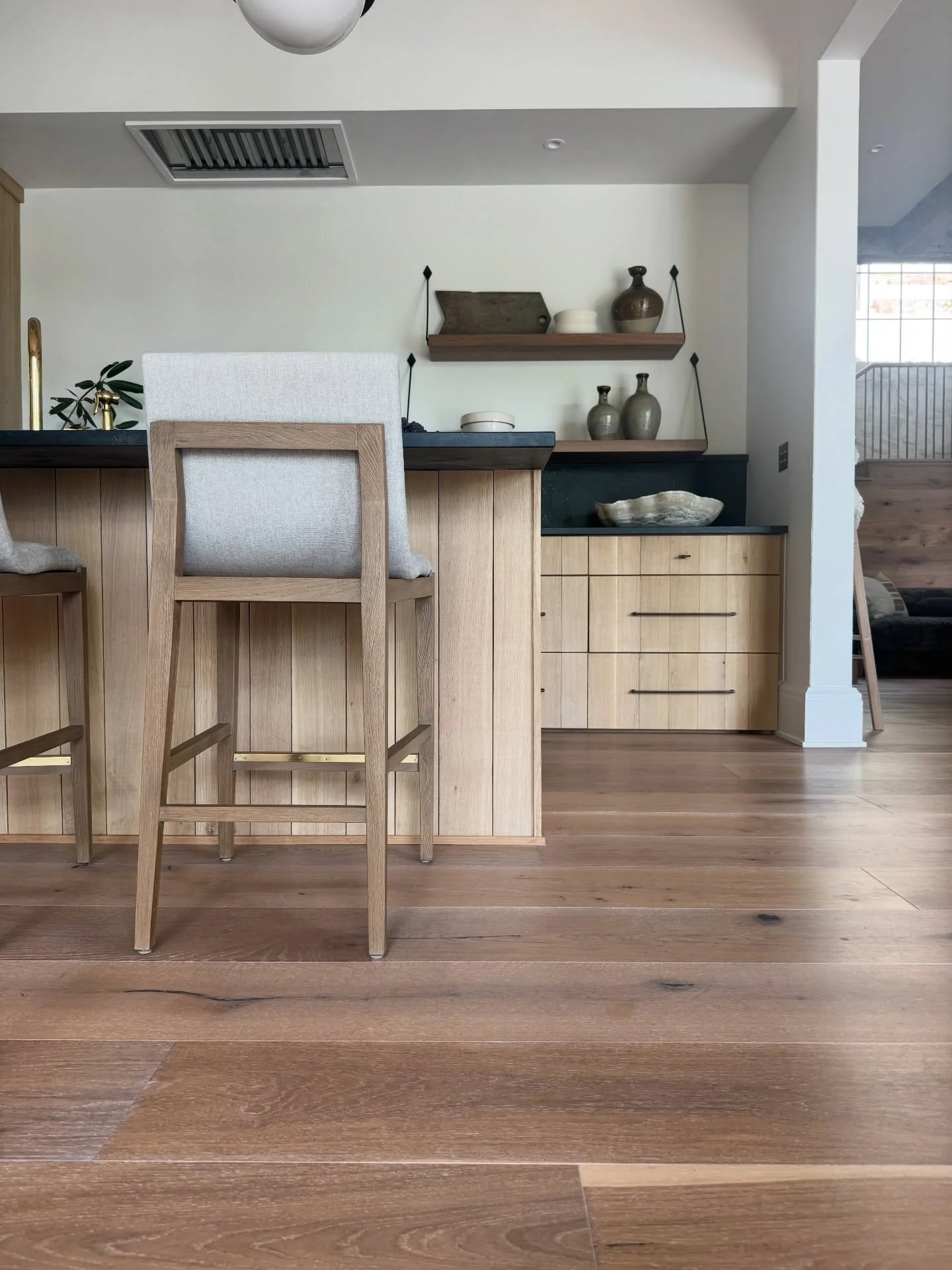 There&rsquo;s something different about real wood in a kitchen.

Warm. Grounded. Timeless.

Our expansive engineered white oak planks in a natural finish brings depth and quiet luxury to the heart of the home. Authentic character. Designed for everyd