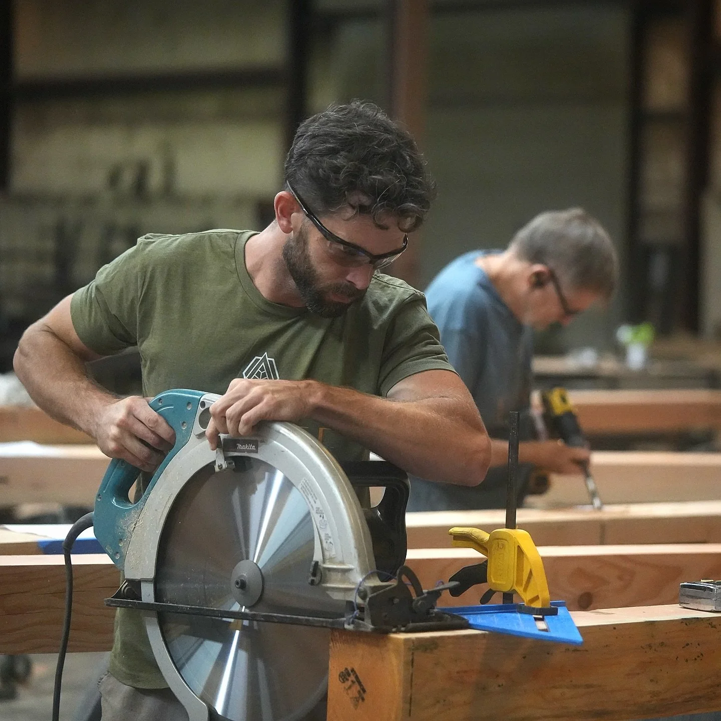 Strong design starts here. A behind-the-scenes look at a timber frame project in action at our shop: each beam is cut, test-fitted, and assembled by hand, turning raw timber into a structure that&rsquo;s built to last. Precision, teamwork, and craft 