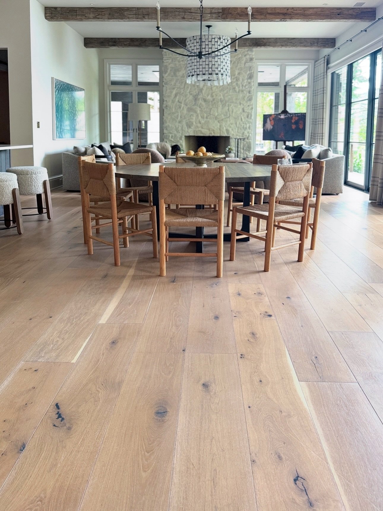 Some floors simply fill a space. Others define it.

Our long length European sawn engineered character white oak flooring in our Mountain Hearth finish was crafted to bring depth, scale, and natural warmth to interiors like this one. The wide planks 