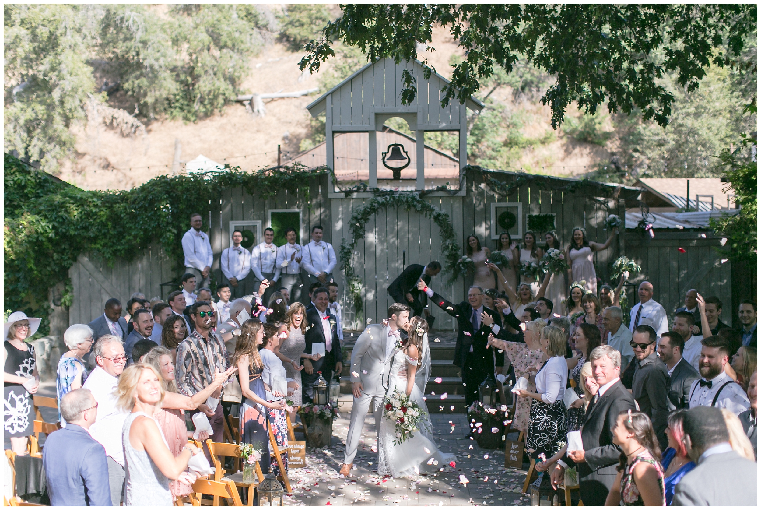 Copy of elegant homestead wilshire ranch wedding bride groom kiss ceremony carrie vines