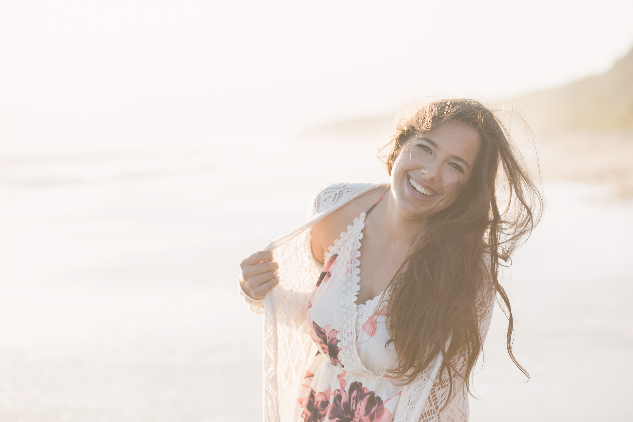high-school-senior-portraits-smiling-crystal-cove-carrie-vines.jpg