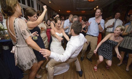 Bride and groom getting down