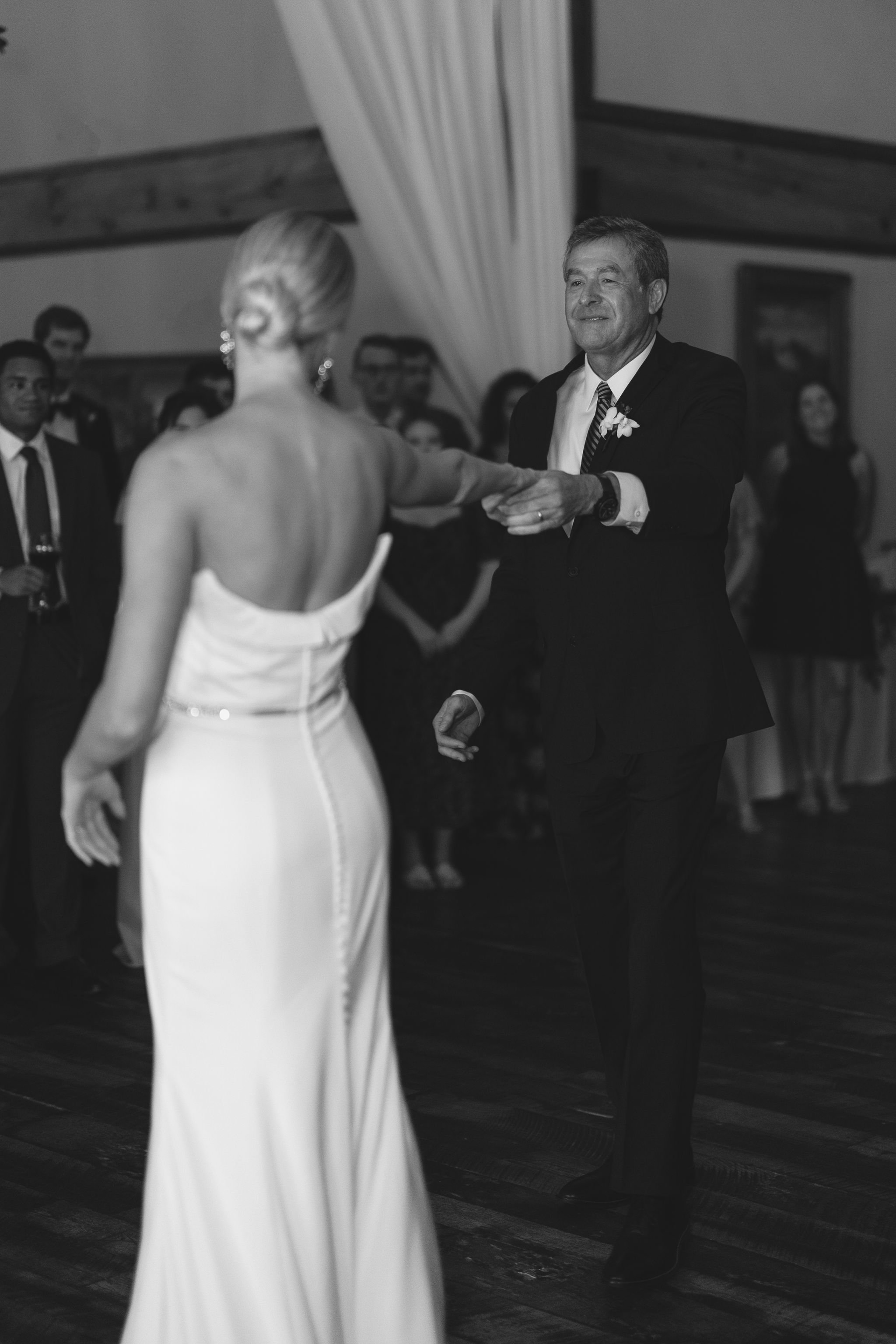 Father dancing with daughter