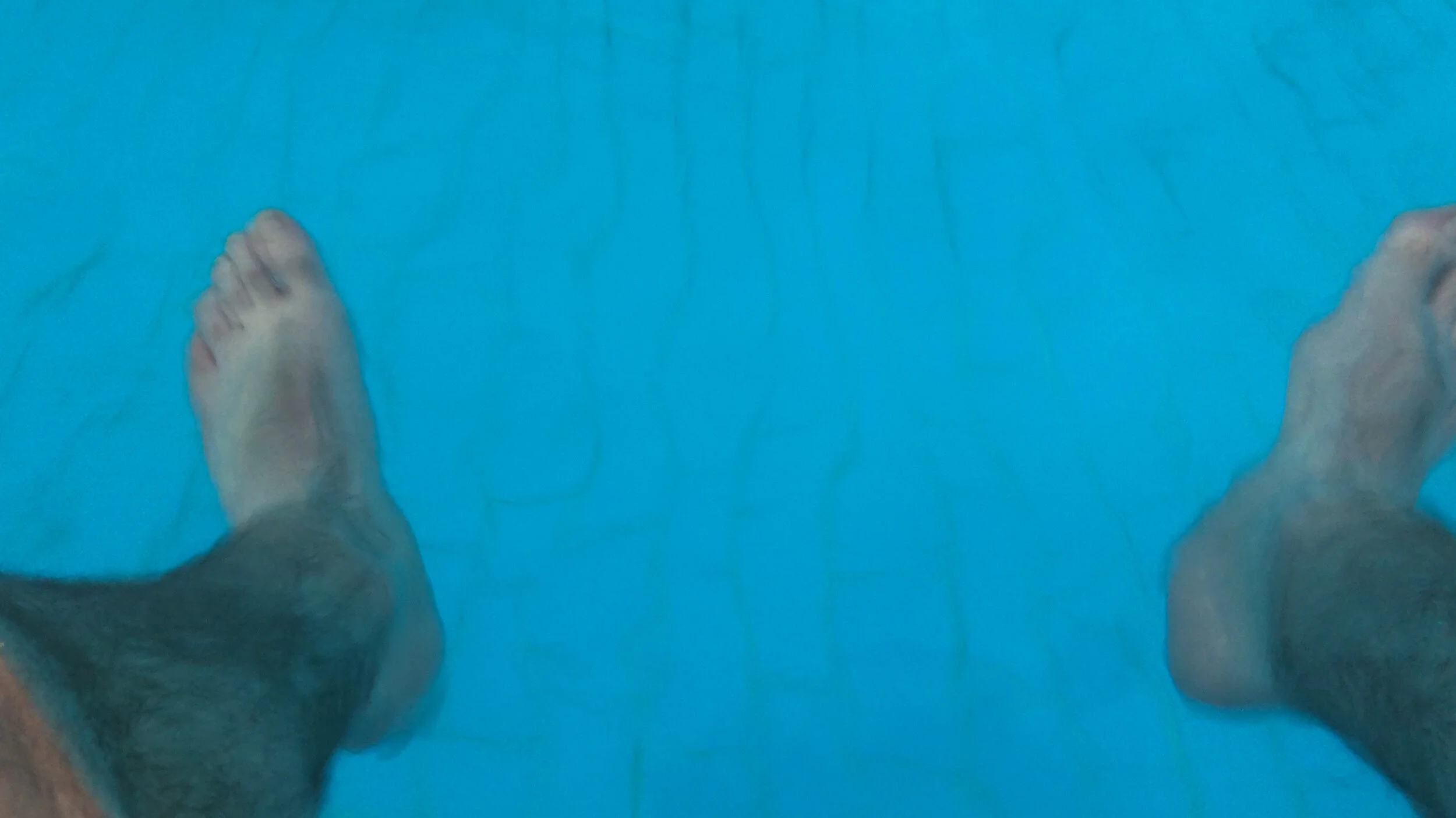 Feet in Pool HPOW5605.MOV.00_00_00_00.Still001.jpg