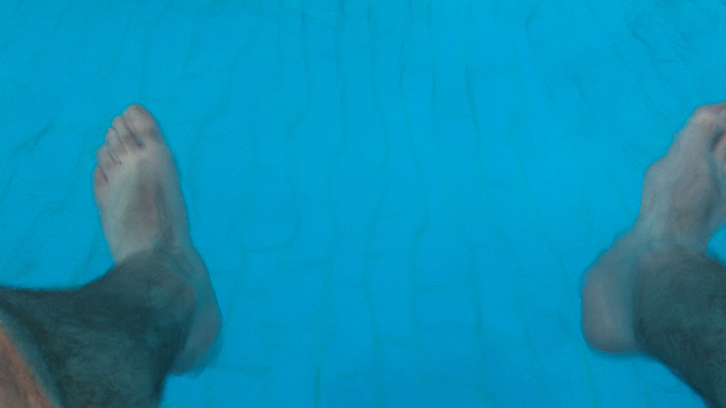 Feet in Pool HPOW5605.MOV.00_00_00_00.Still001.jpg