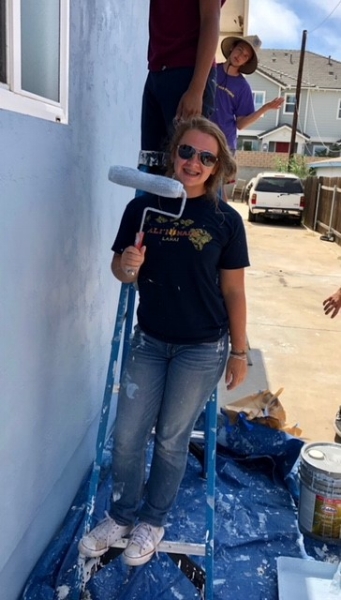 Heather putting the final touches on their project