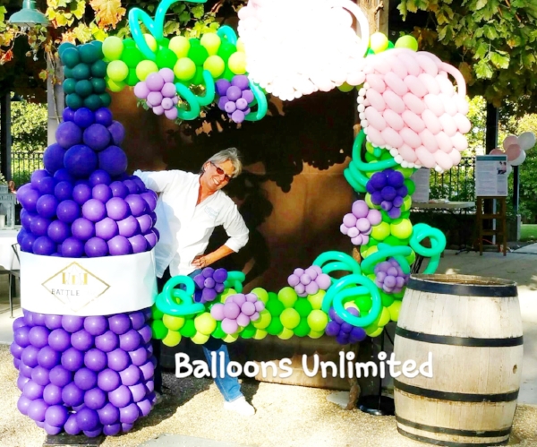 Kathy, owner of Balloons Unlimited with one of her creations