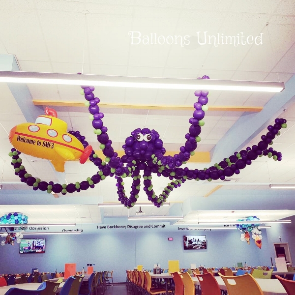 An underwater theme with a giant hanging balloon octopus