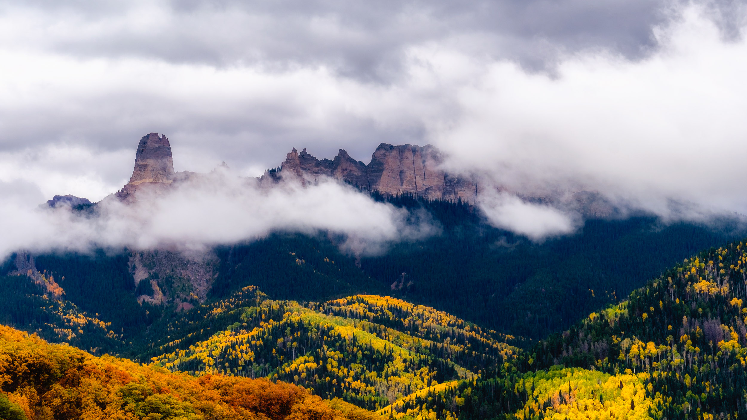  Storm clouds surround Chimney Rock and Courthouse Mountain along Owl Creek Pass in the Uncompahgre National Forest - Fuji XT2, XF 50-140mm f/2.8 @ 71.5mm 