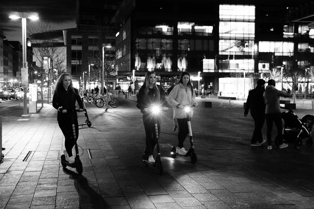 Girls out on electric scooters at Union Station