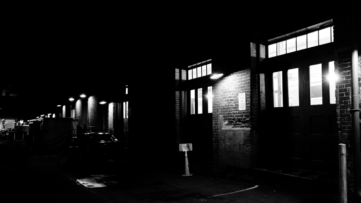 The windows and lampshades light the dark alleyways in Denver, Colorado