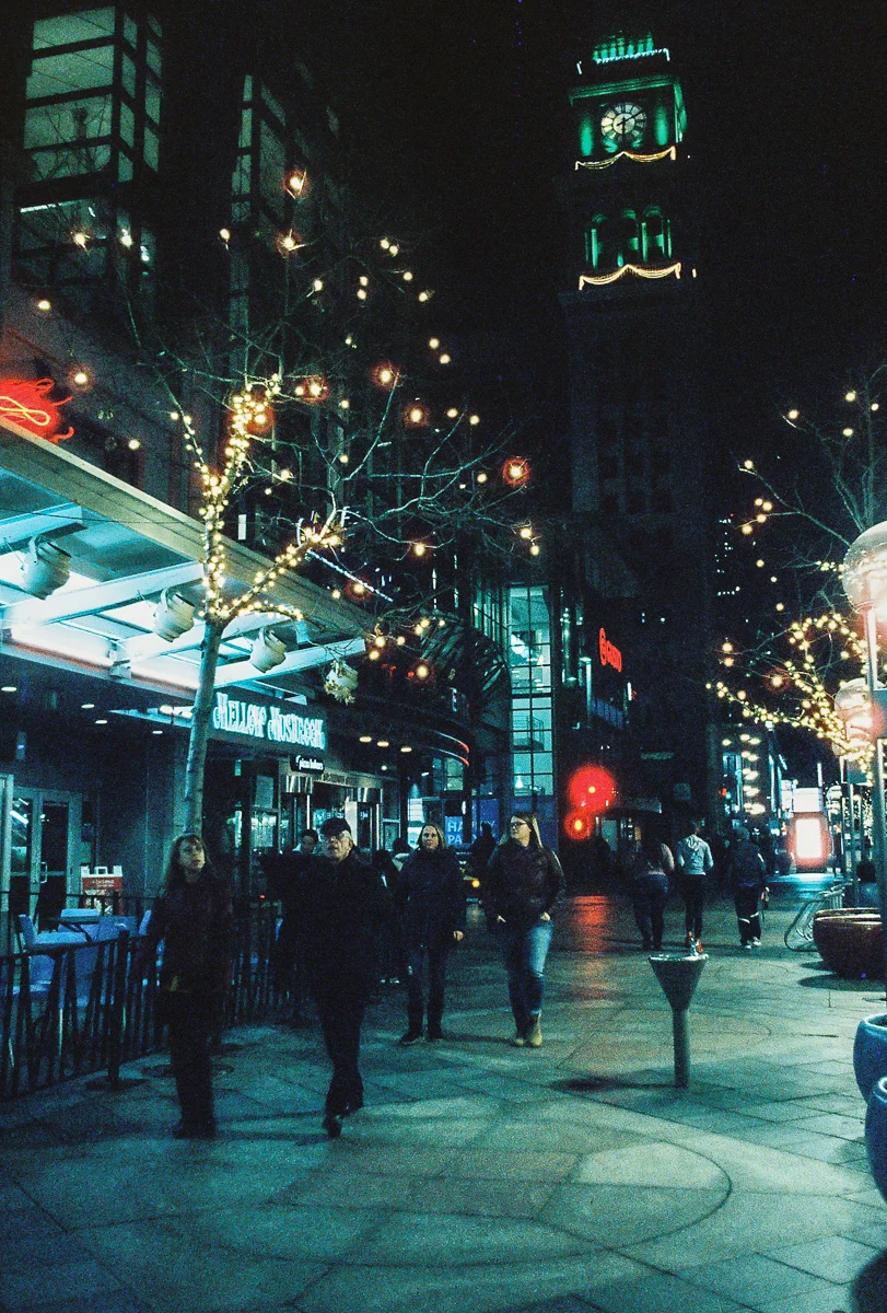 Walking along the 16th Street Mall with a view of the clock tower.