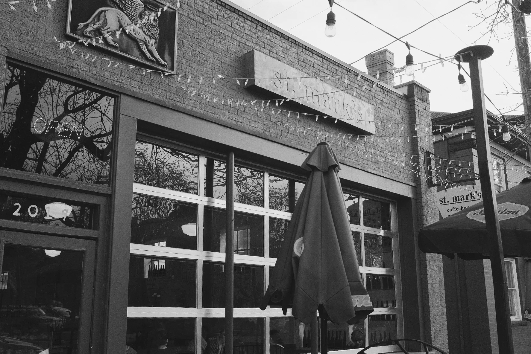 Day 74- 365 Day B&W Photo Challenge - St. Mark’s Coffee House is a perfect place uptown to get a good cup of coffee and they have a wonderful Veggie Pannini. - Fuji X100F, Acros R Film Simulation, edited in VSCO with B3 Film Simulation