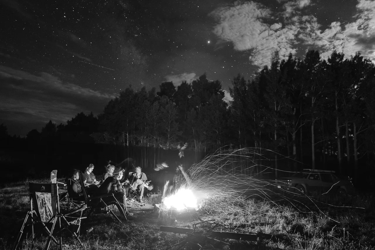 Day 227- 365 Day B&W Photo Challenge - Enjoying a campfire on a cool evening in the San Juan Mountains. - Fuji X-T3, XF 14mm f/2.8, Acros G Film Simulation