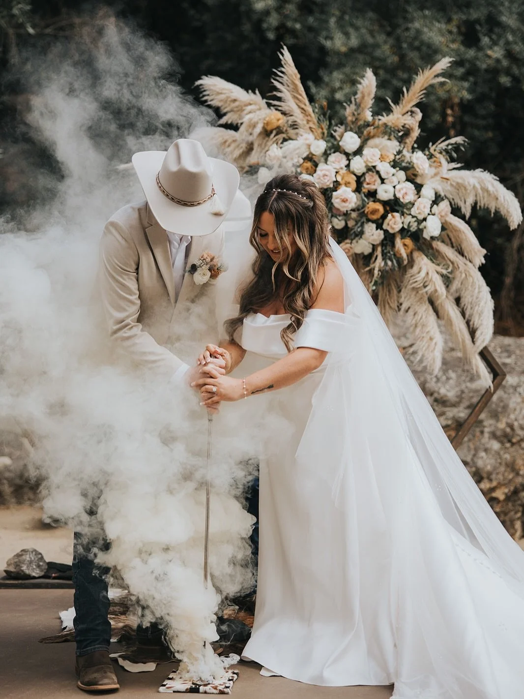 Sand ceremonies are cool and very classic, but how about a branding iron ceremony? Such a cool and unique part of the wedding ceremony!