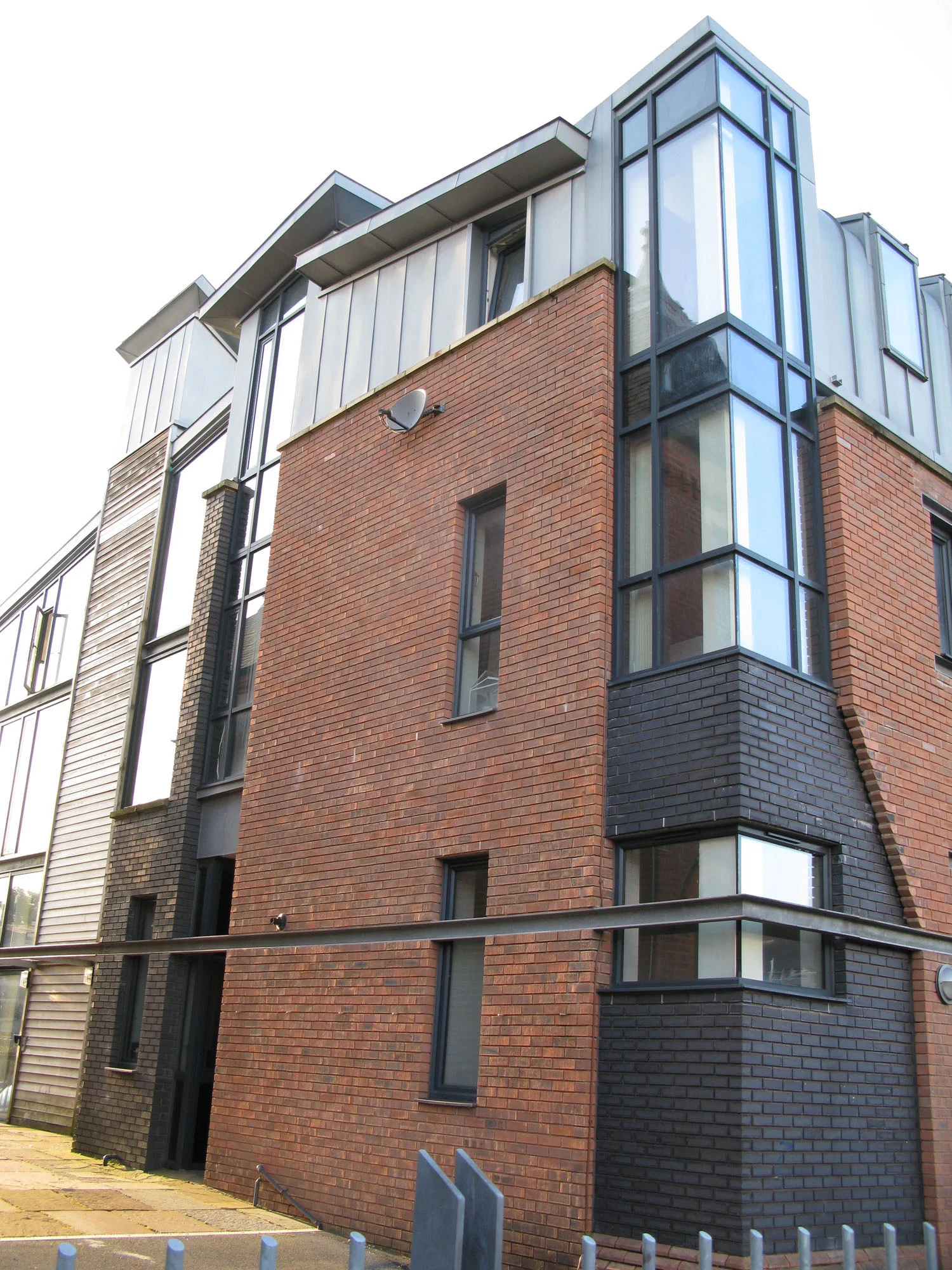 Bailey St - Newbuild - corner detail, conceived as a mirrored negative of corner of existing church adjacent
