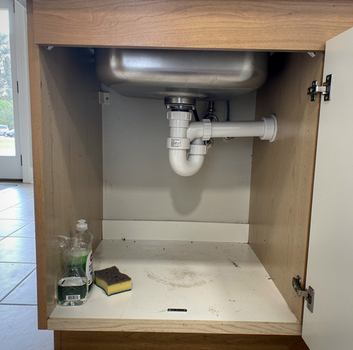 slow draining kitchen sink with garbage disposal