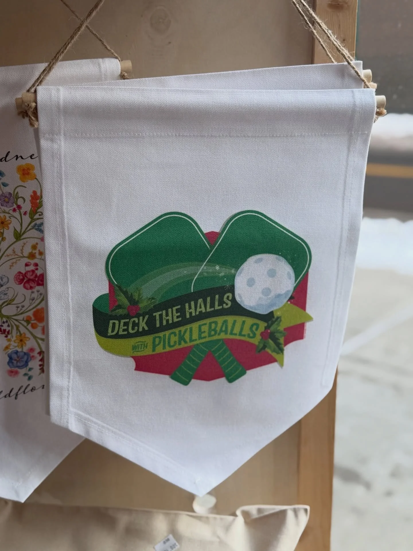Deck the halls with pickleballs! 
Hanging banners for your favorite enthusiast by @illustratorerin