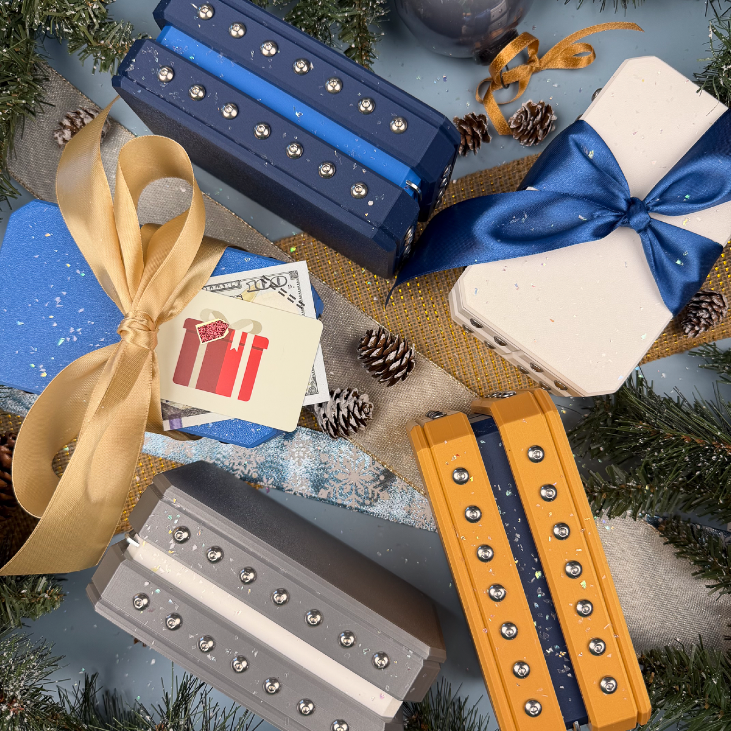 Holiday Luxury Annoying Gift Boxes in blue, white, gold, and silver with 44 screws and glitter bomb. Reusable prank box for gift cards or cash, ideal for Secret Santa or white elephant.