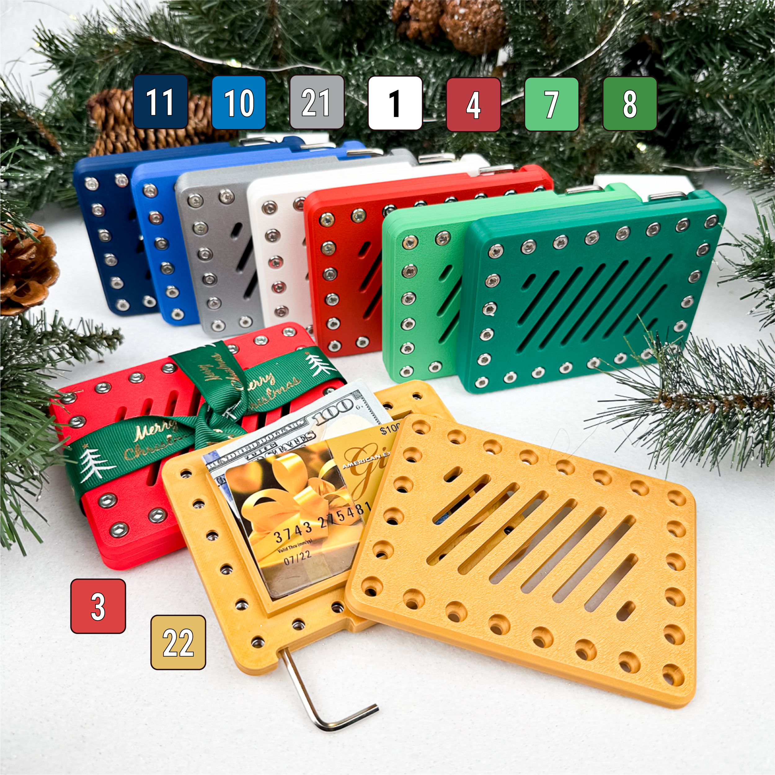 Holiday Lockup Gift Card Holders in Pure Snow, Molten Rose, Cherry Inferno, Minted Moss, Imperial Emerald, Arctic Spark, Nautical Twilight, Polished Mercury, and Golden Mirage.