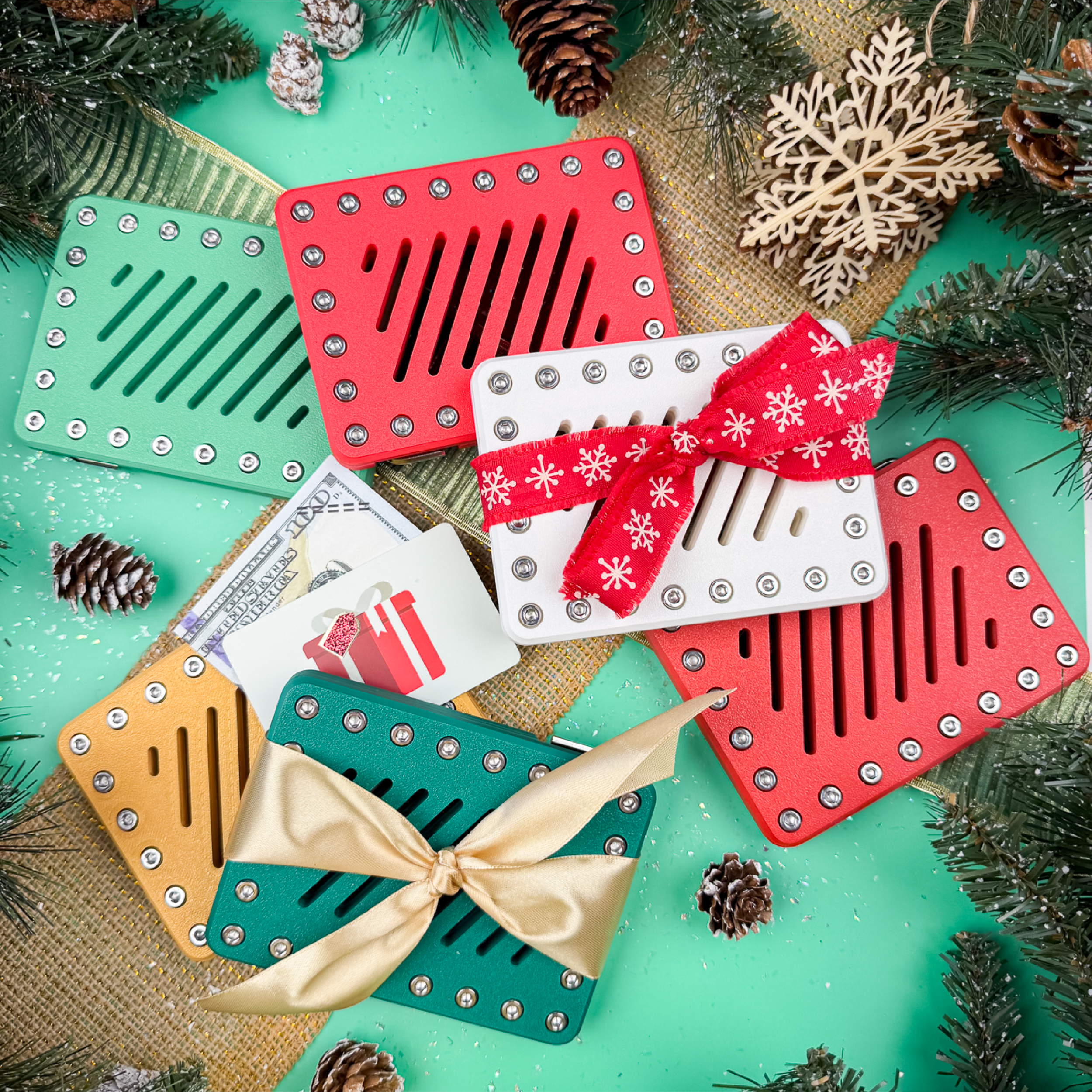 Lockup Gift Card Holders in Molten Rose, Imperial Emerald, Golden Mirage, and Pure Snow. Festive puzzle boxes for cash or gift cards, perfect Christmas prank, stocking stuffer, or Secret Santa.