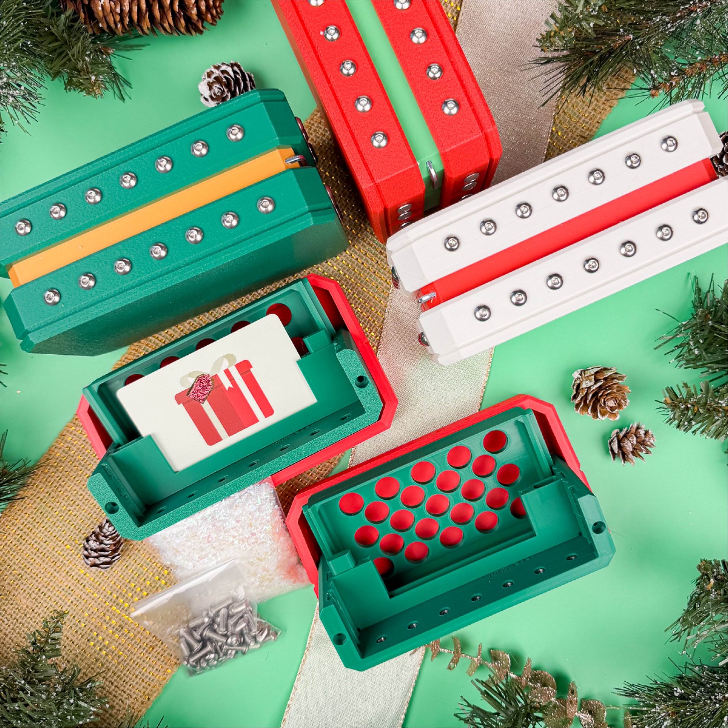 Holiday overview of Luxury Annoying Gift Box in multiple colors. 44-screw glitter prank box for gift cards or cash, perfect for Christmas gag gifts, Secret Santa, or white elephant.