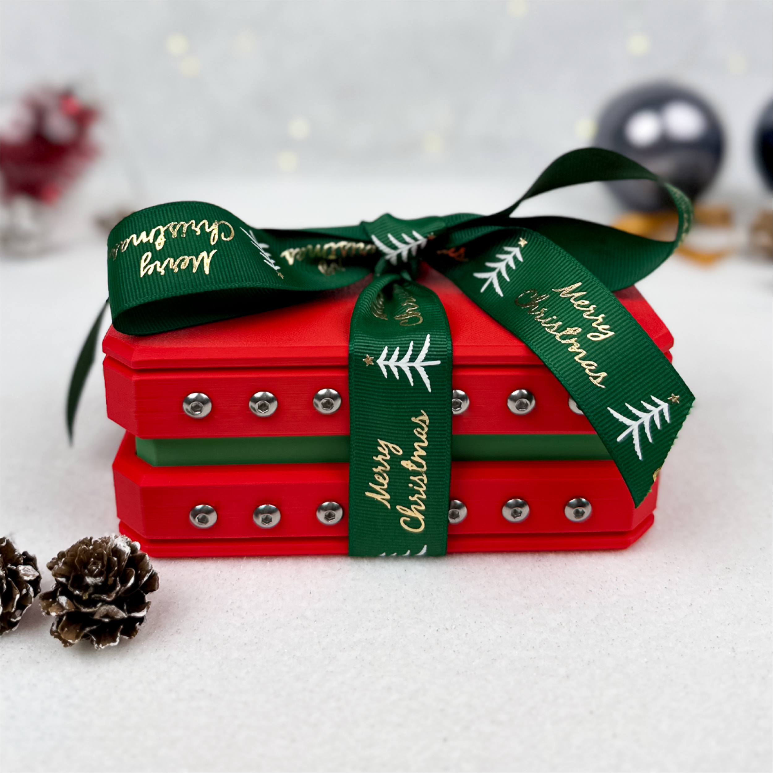 Luxury Annoying Gift Box in red and green with 44 screws and glitter bomb. Holiday prank gift card or cash holder, perfect for Secret Santa, white elephant, or Christmas gifting.