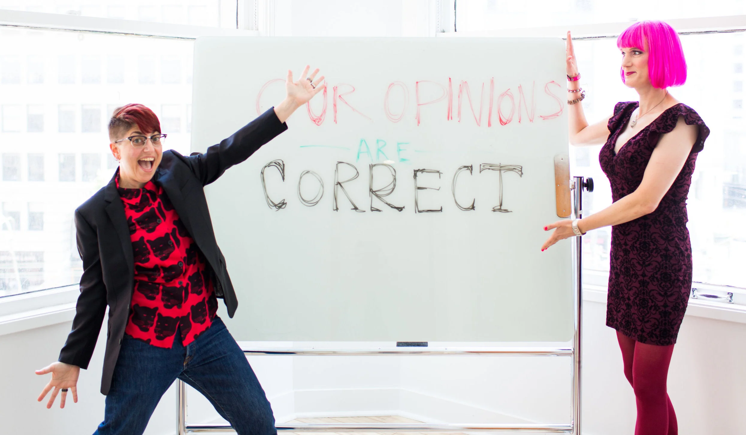 Red at left: Annalee Newitz. Pink at right: Charlie Jane Anders. Photo credit: Sarah Deragon