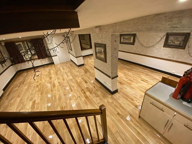 This floor was quickly becoming a problem due to cupping caused by a leak. After inspecting the extent of the damage, we were able to sand the entire area completely flat saving the owners from having to replace what turned out to be a lovely oak flo
