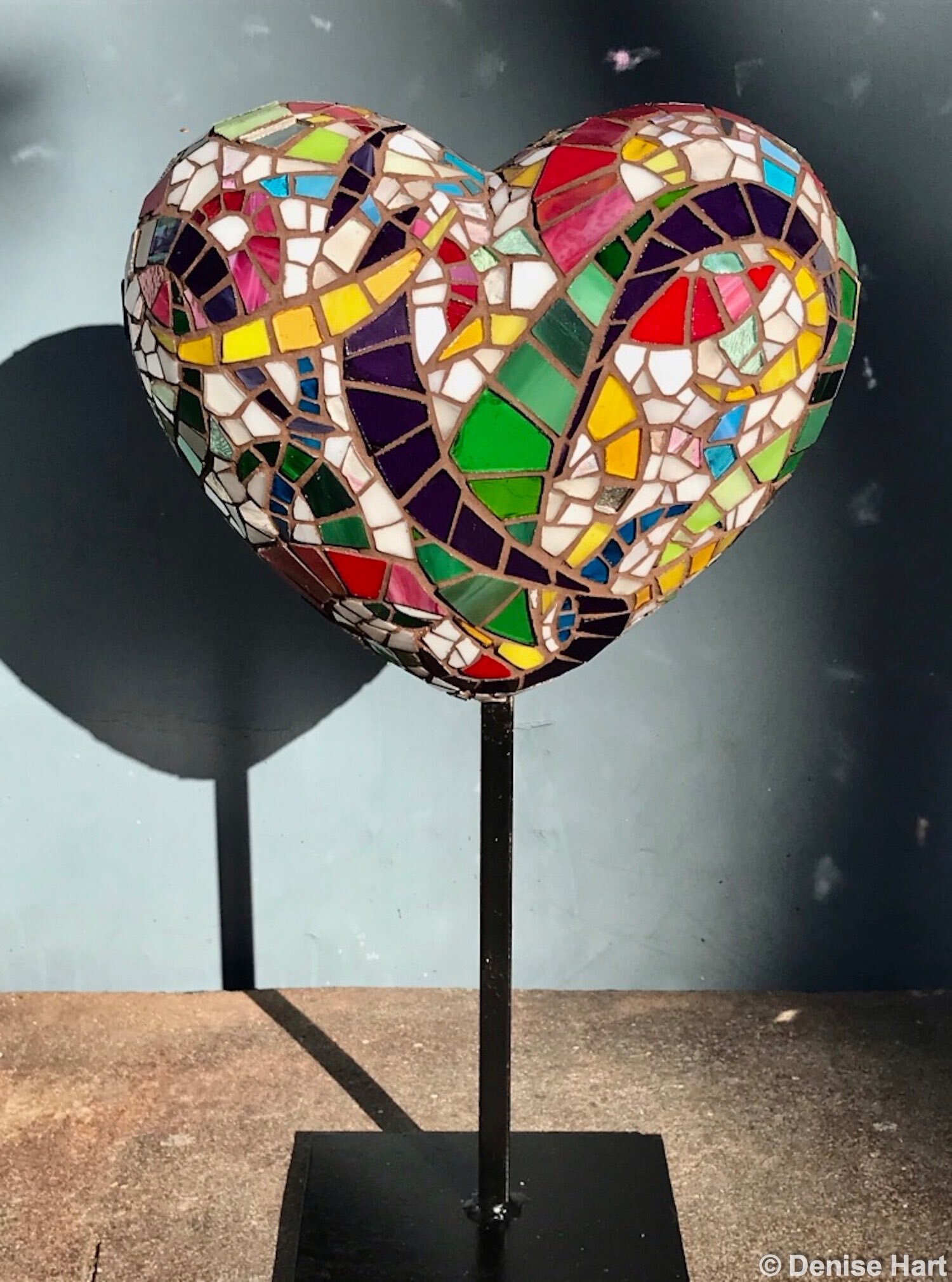 Heart mosaic sculpture (front), glass