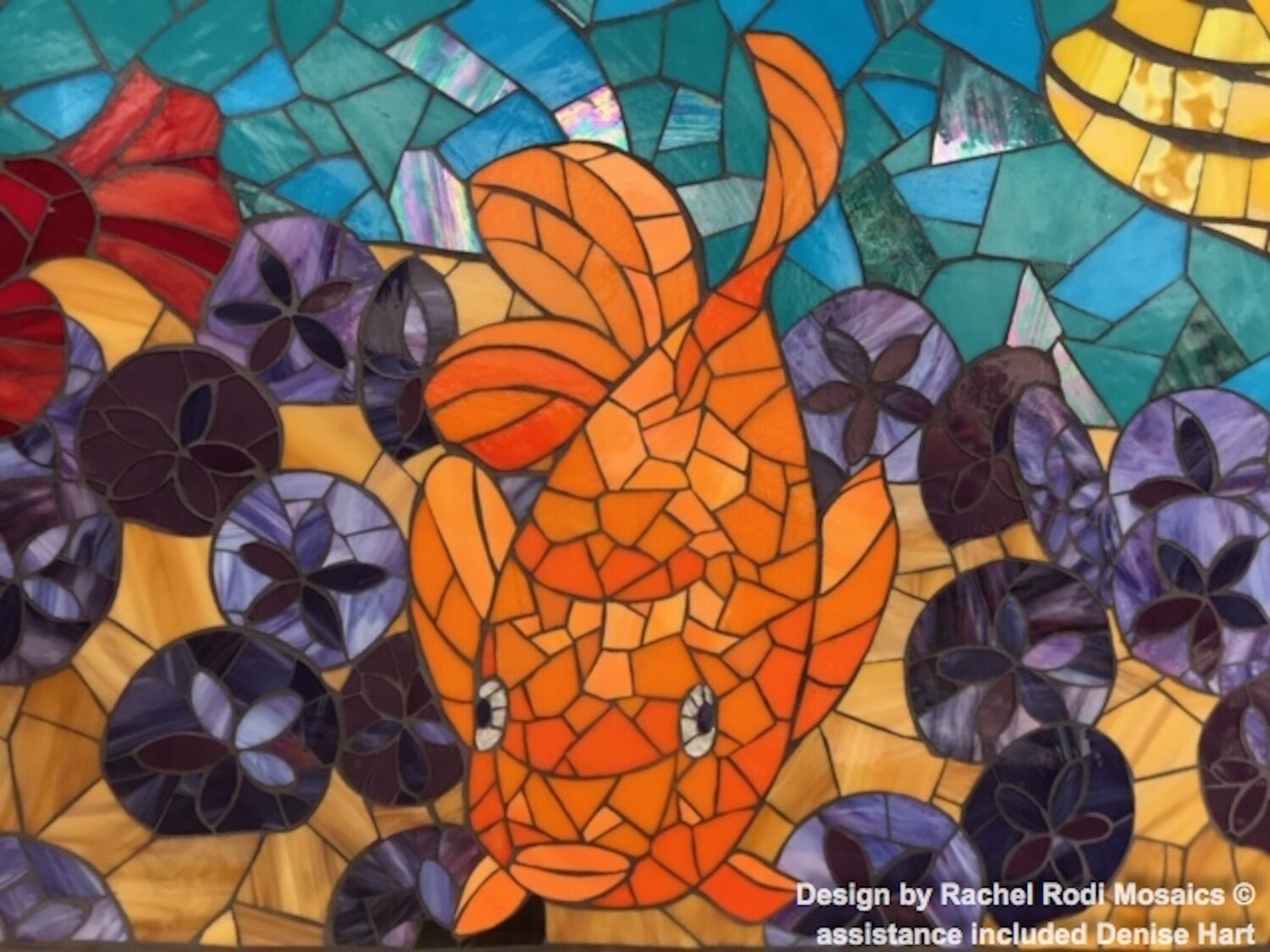 Close-up of mosaic, fish, glass