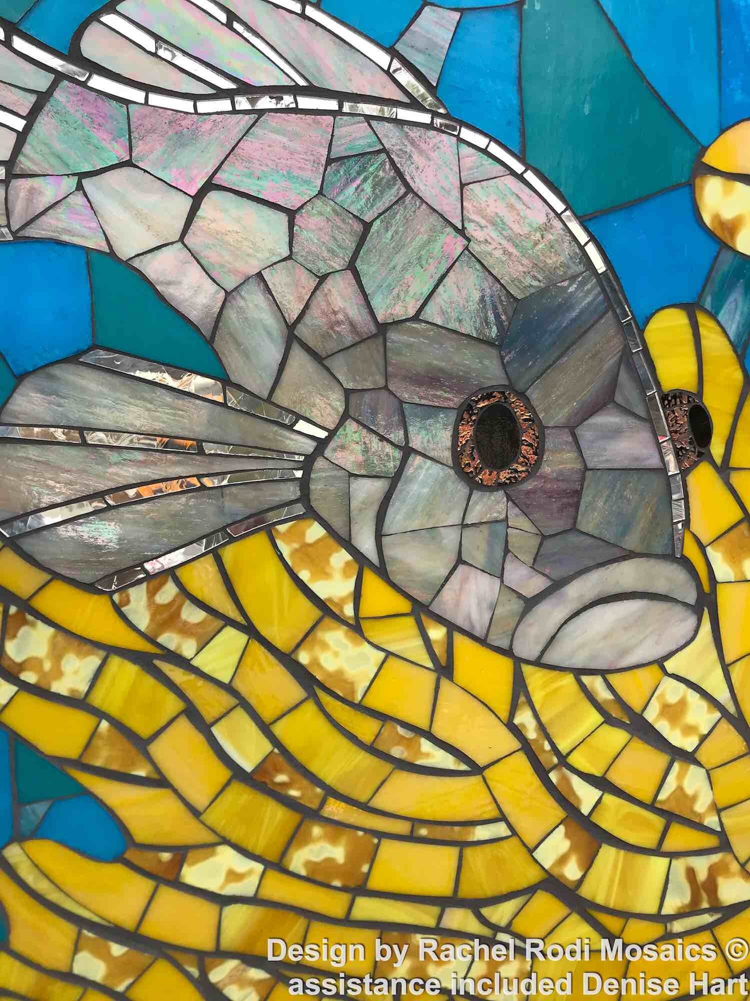 Close-up of mosaic, fish, glass