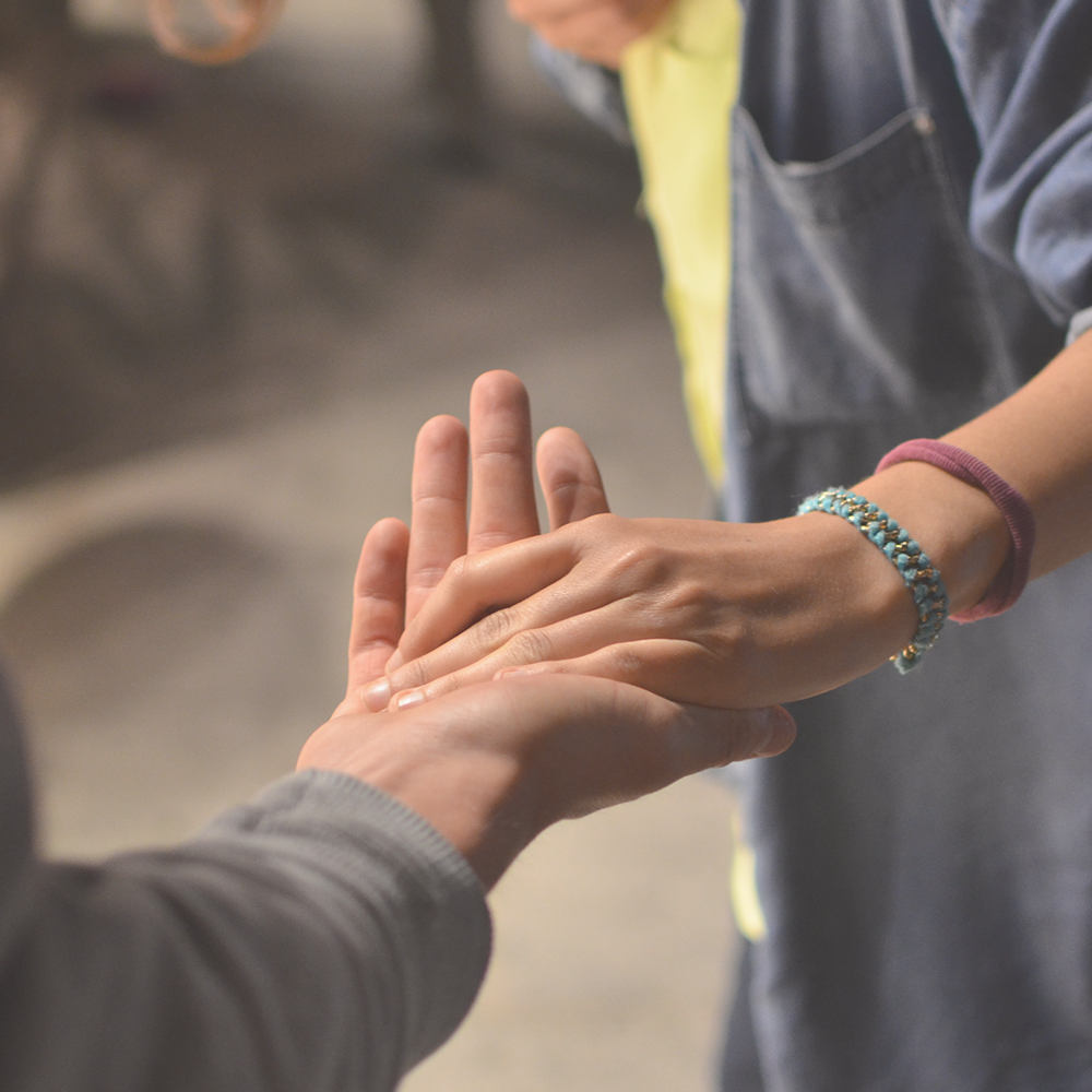 PillarsGivingHands.png
