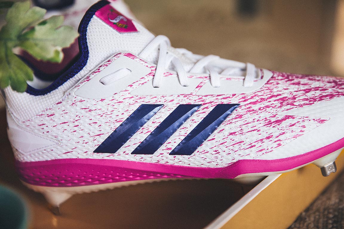 purple adidas baseball cleats