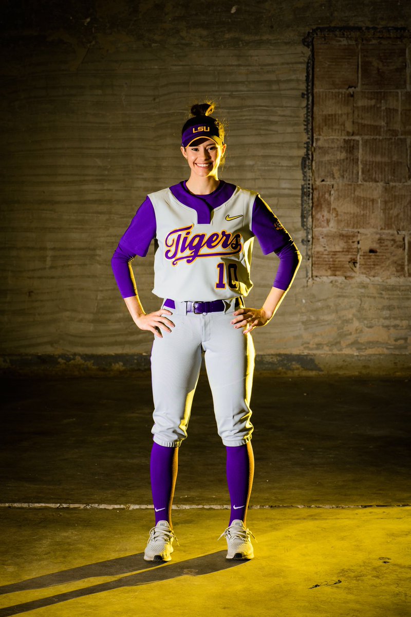 purple softball uniforms