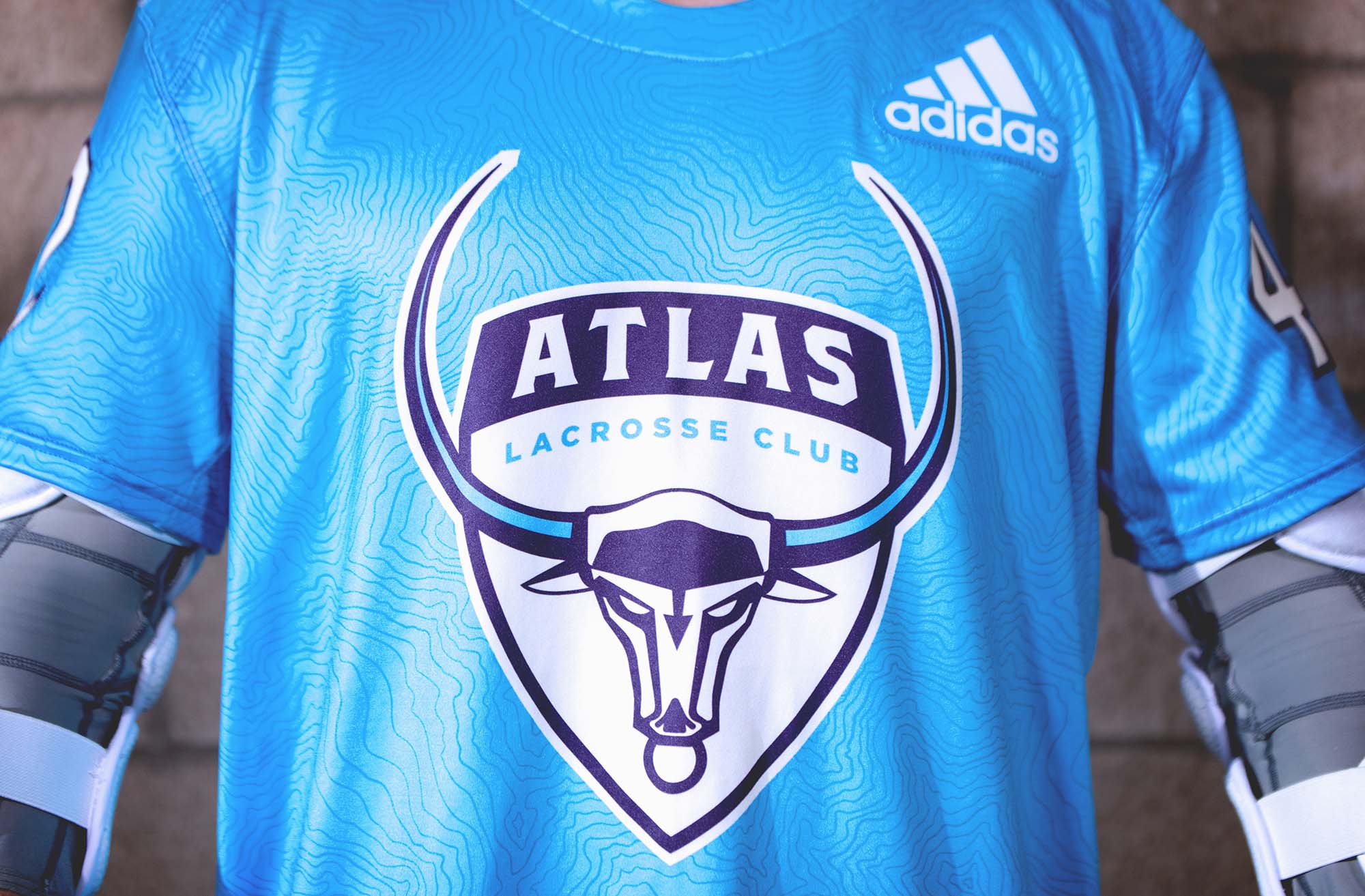 adidasLacrosse_PLL_ATLAS_Crest_Home_01.jpg