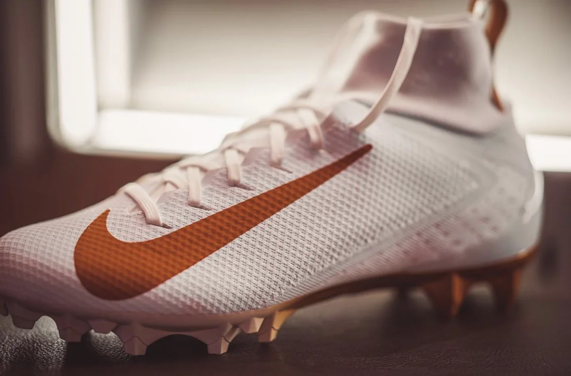 burnt orange football cleats