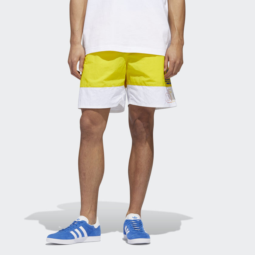 Pride_Freestyle_Woven_Shorts_Yellow_GD0954_21_model.jpg