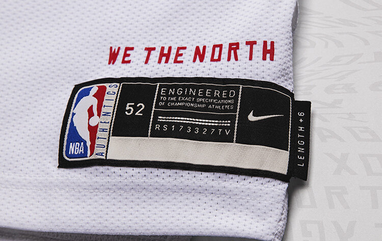 toronto-raptors-we-the-north-tag-white-association-jersey-new-uniform-2020-21-sportslogosnet.jpg