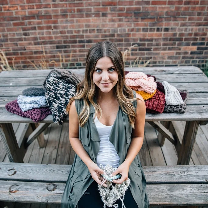 Mamina Handmade - Cleveland, Ohio Mamina Handmade was founded in 2014 and is independently run by Cleveland based designer, Maria Ianiro. She is the face behind the brand as well as the designer, maker, creator and enthusiast of all things cozy. MH prides itself in designing made-to-order stylish, yet functional, knit and crochet accessories for those cool weather days. Maria is involved in every step of the highly personal, hands-on process. Each piece is hand knit and hand worked at her in-home studio which gives each product a personalized touch. The name “Mamina” is inspired by Maria’s mother who taught her the fundamentals of knitting and crocheting. maminahandmade.com