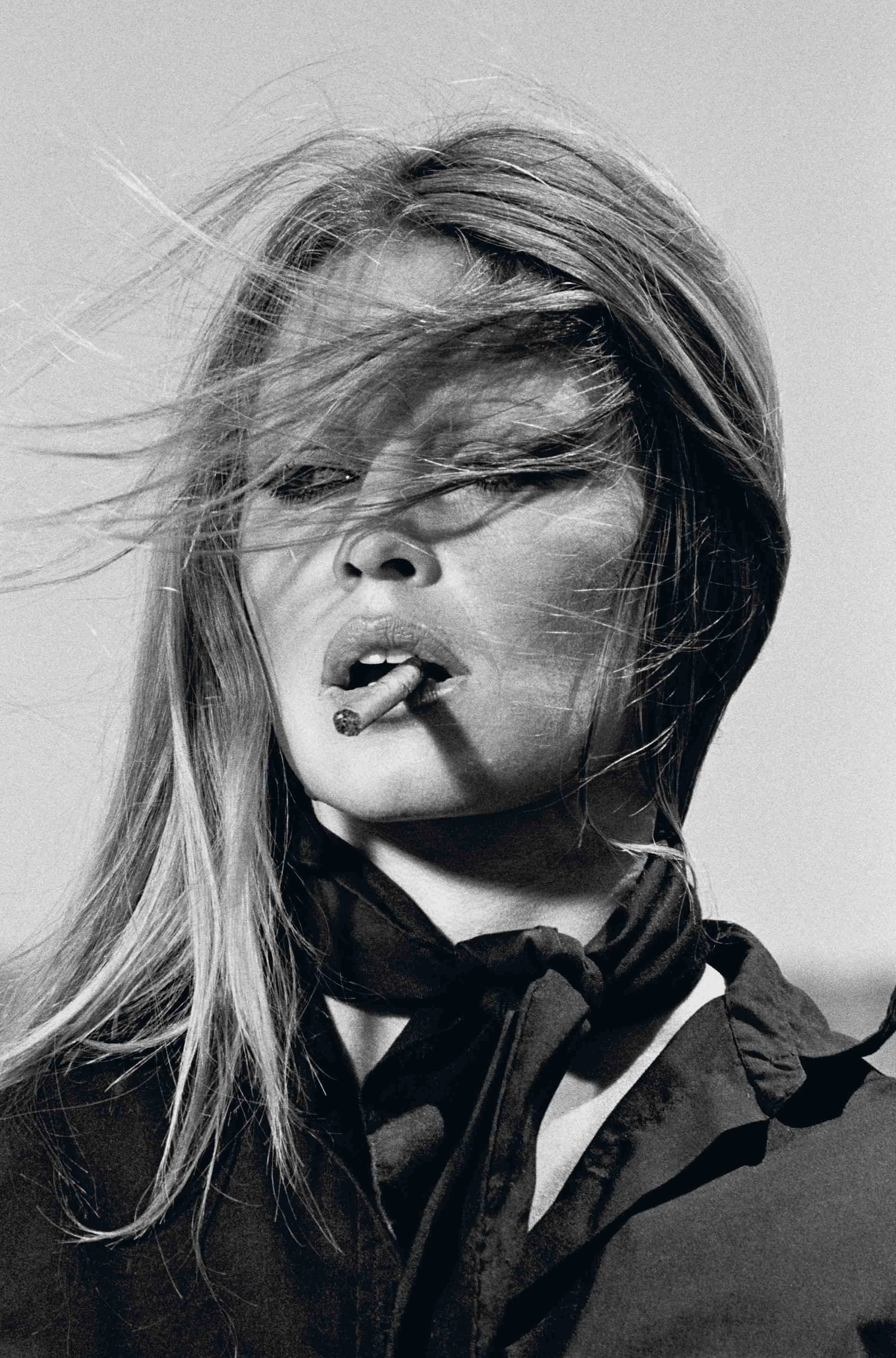 Brigitte Bardot with cigar by Terry O`Neill CO-signed. Silver gelatin Available in several sizes Price on request
