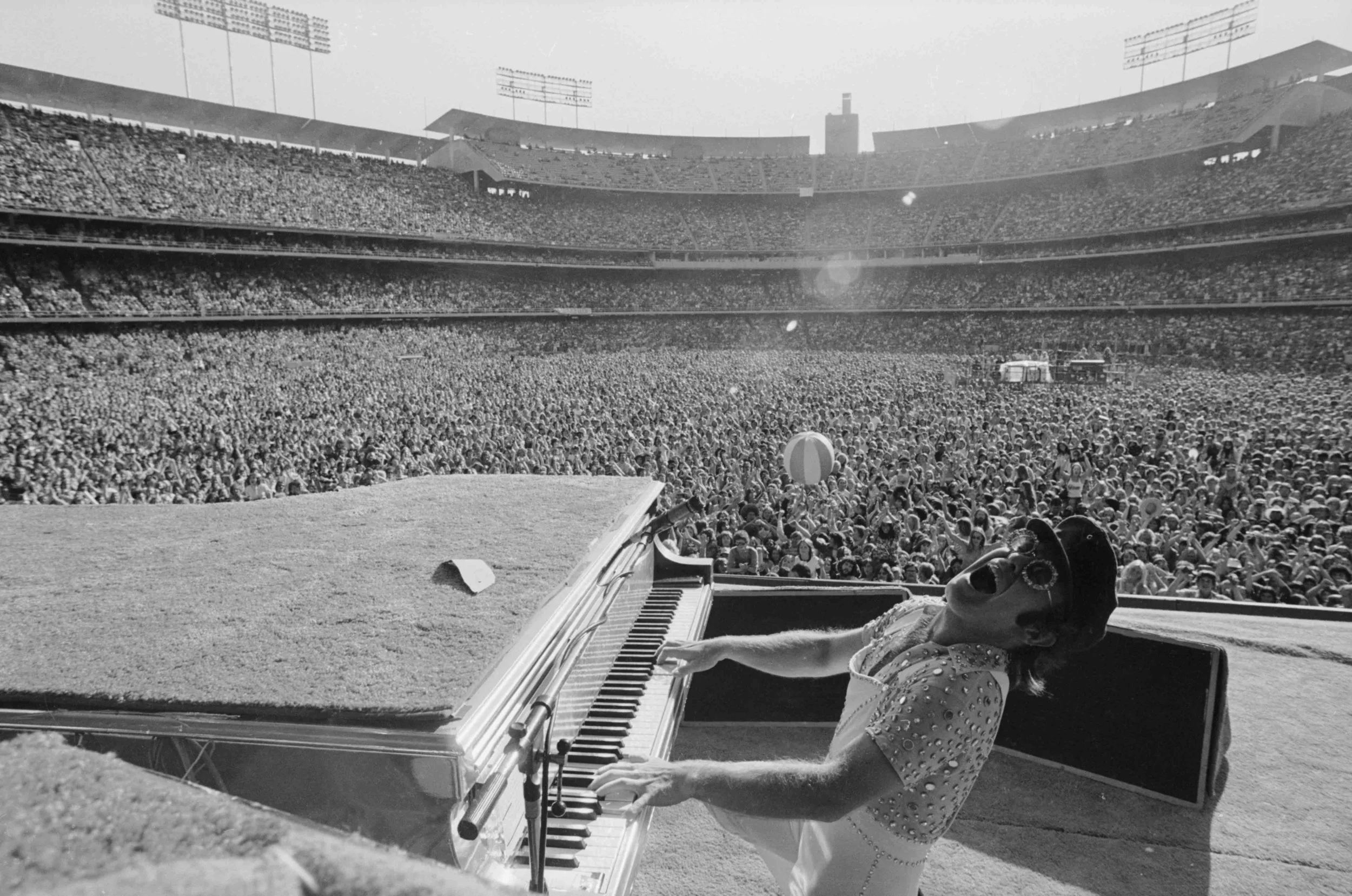 Elton John, Dodgers stadium Los Angeles 1975 by Terry O`Neill Ed 50,Silver gelatin Available in several sizes Price on request