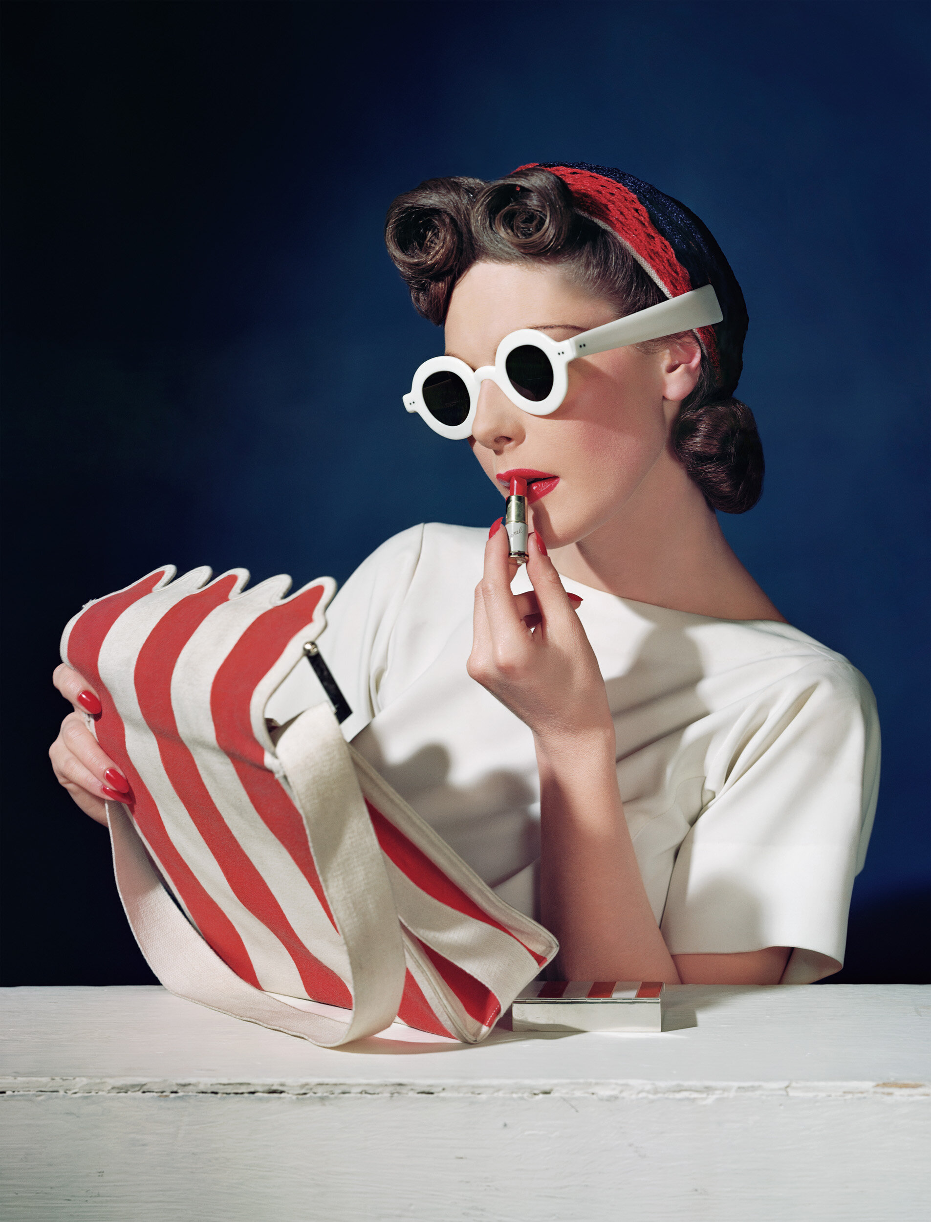Muriel Maxwell, Ensemble by Sally Victor, Bag by Paul Lato, Sunglasses by Lugene, 1939