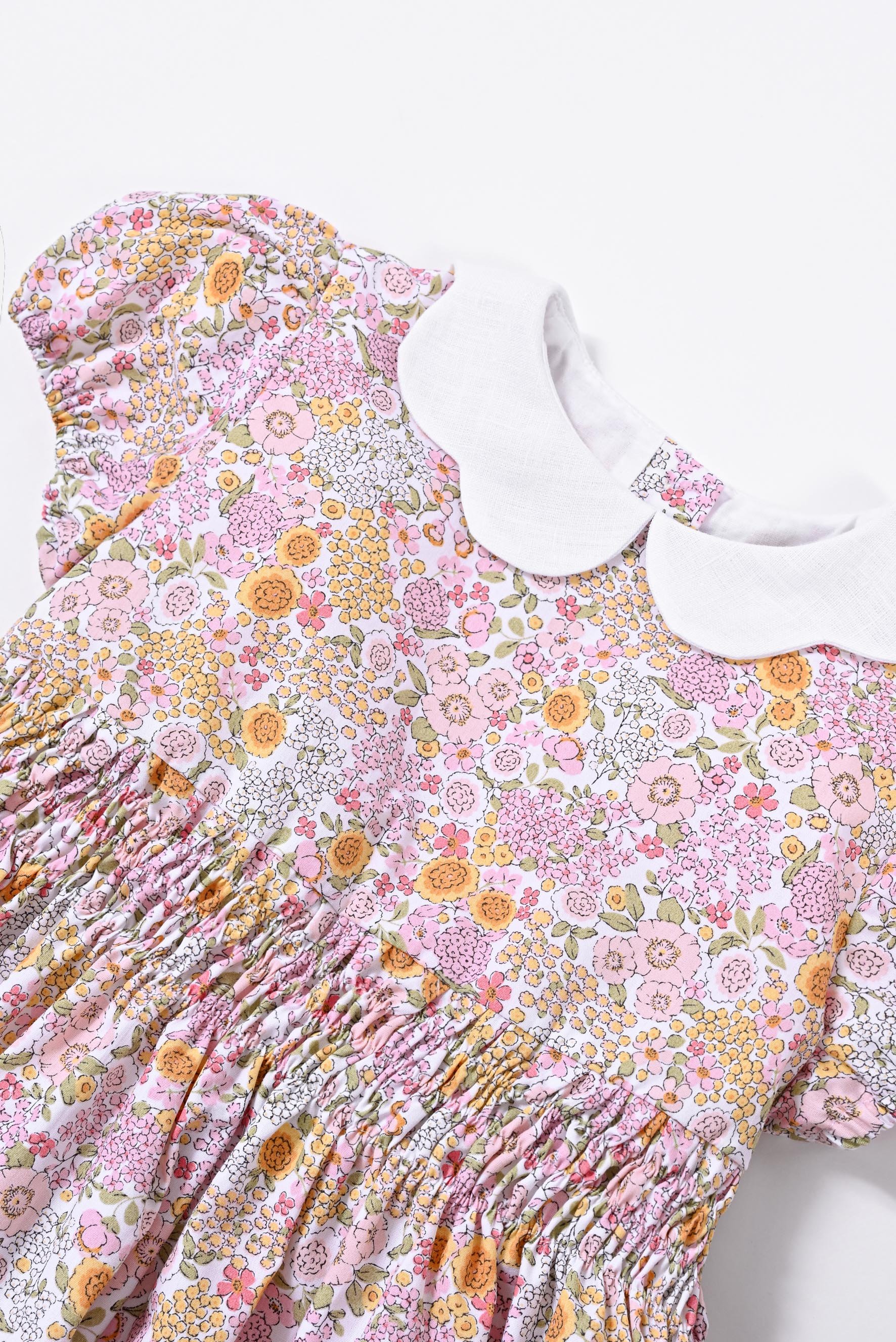 Vestito bambina elasticato fiore rosa giallo dettaglio corpetto