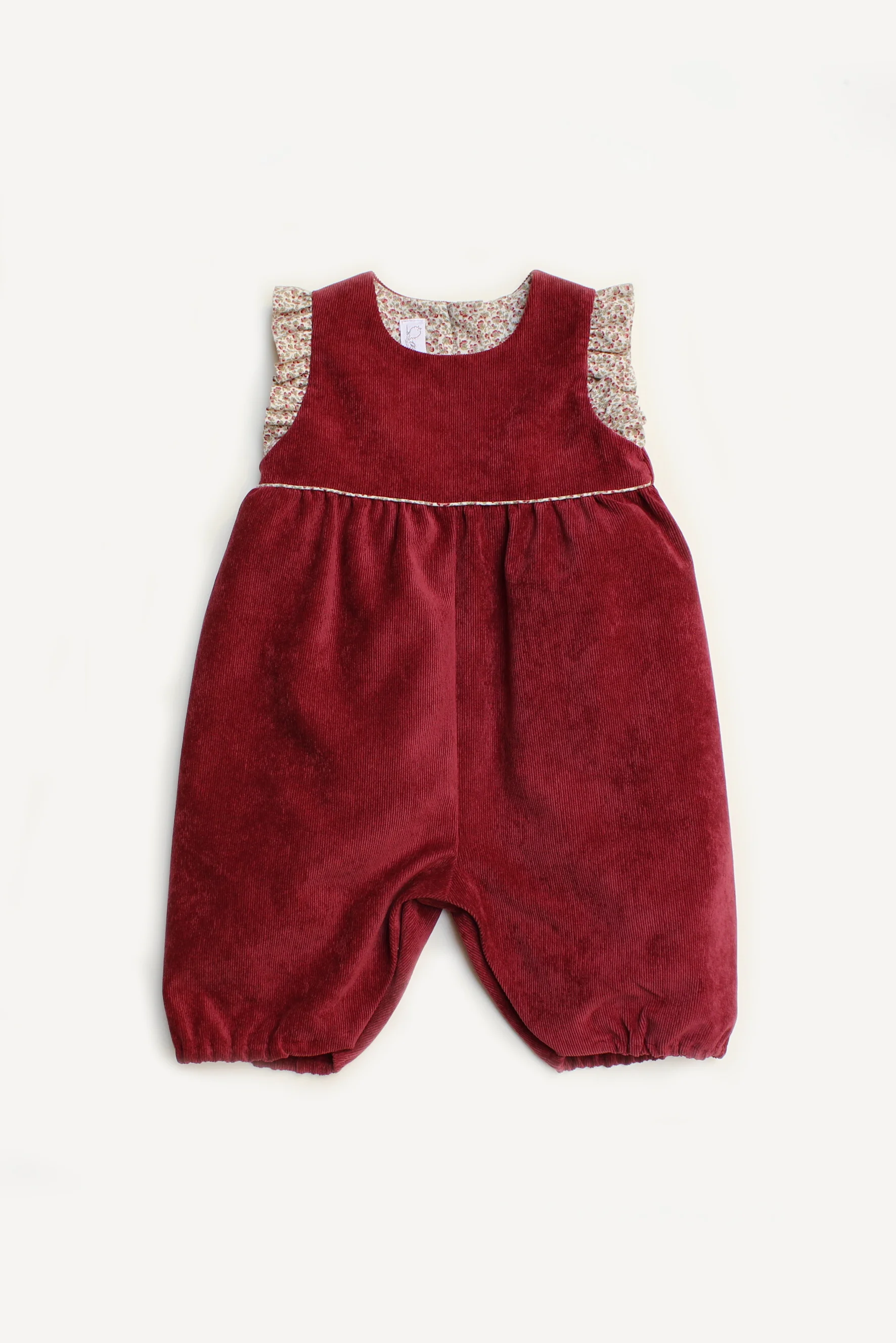 Pagliaccetto neonata in velluto bordeaux con ruches a fiori